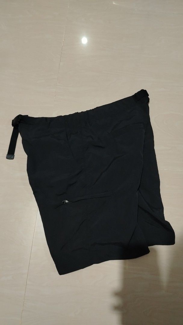 Black Cargo Shorts with Belt (Category: Shorts) located in Tagum. Submitted by kotasallys40096 (Listing ID 1460049068, Image 2). Description: - Black nylon utility geared short - Medium on tag -waist: 32-34, length: 18, hem 11.5 - Adjustable belt included - Side zipper pocket for secure storage - Ideal for casual outings or outdoor adventures - Comfortable and relaxed fit - Pre-loved and ready for its next owner.