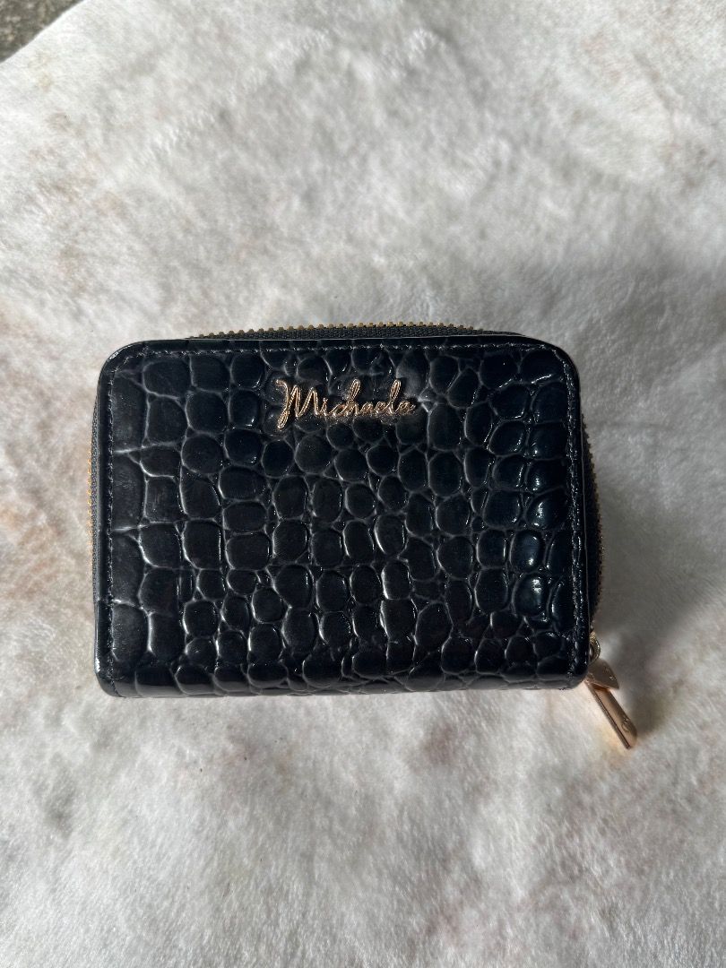 Black Croc Zip Around Card Holder Wallet (Category: Wallets & Card holders) located in Caloocan City. Submitted by eogg30 (Listing ID 1460075649, Image 2). Description: - Sleek black card holder with elegant croc texture. - Secure zip-around closure. - Multiple internal card slots for organization. - Stylish gold hardware accents. - Compact design, perfect for pockets and small bags..