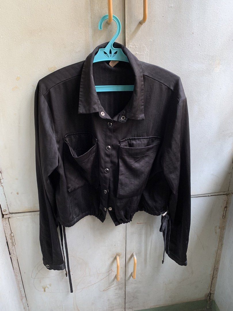 Black Cropped Jacket (Category: Coats, Jackets and Outerwear) located in Manila. Submitted by usagichan_rabbit (Listing ID 1459943504, Image 1). Description: - Dazy-Less black cropped jacket - Collared neckline - Button-up front closure - Two chest pockets with button closures - Adjustable drawstring at the hem - Long sleeves with button cuffs - Ideal for layering.