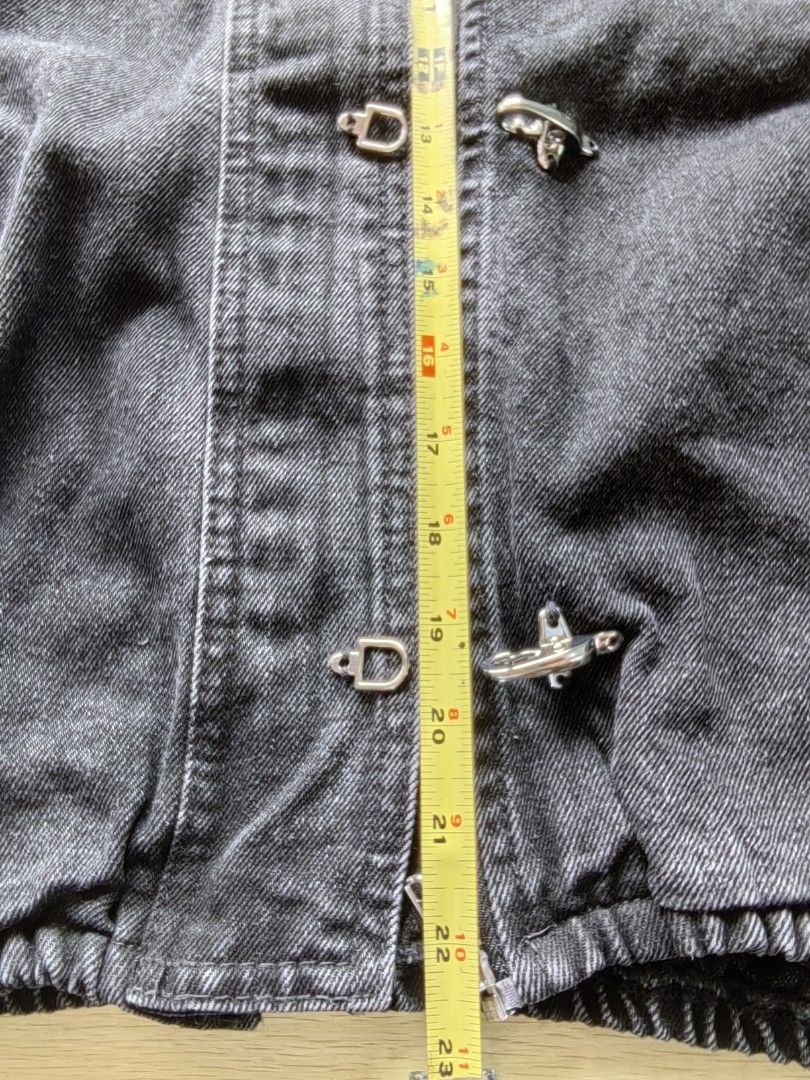 Black Denim Jacket with Toggle and Zip Closure (Category: Coats, Jackets and Outerwear) located in Quezon City. Submitted by brycine022416 (Listing ID 1460061422, Image 3). Description: - Black denim jacket - Zip-up front with toggle closures - Elasticated hem and cuffs - Ideal for layering over jeans or dresses - Effortless casual styling.