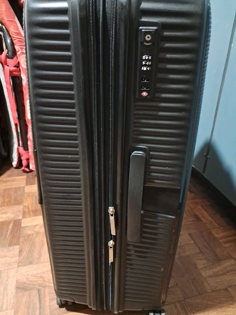 Black Hardshell Spinner Luggage with TSA Lock (Category: Luggage) located in Muntinlupa City. Submitted by caseypeech (Listing ID 1459981902, Image 2). Description: - Durable black hardshell spinner luggage - Built-in TSA combination lock for security - Interior straps to keep belongings in place - Zippered mesh compartment for organization - Smooth rolling wheels for effortless travel.