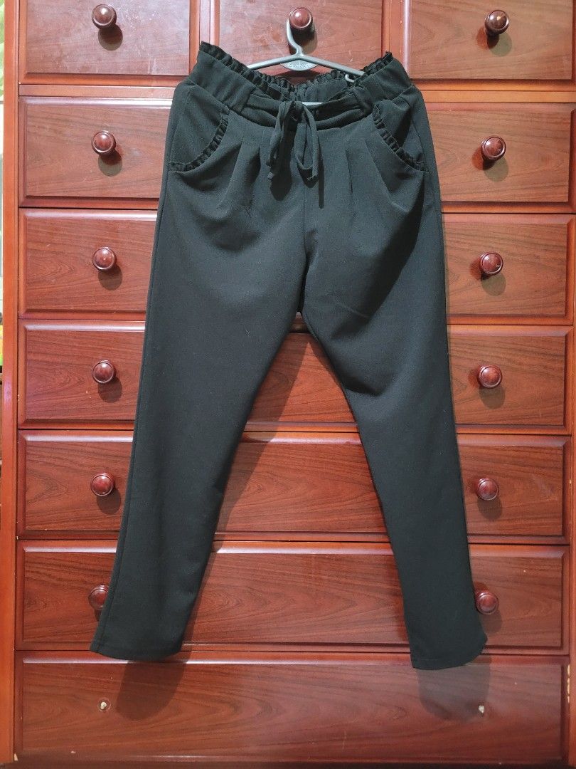 Black High Waisted Paperbag Pants with Tie (Category: Other Bottoms) located in Mangaldan. Submitted by cha_reyna (Listing ID 1459999050, Image 1). Description: - Black paperbag waist pants - Elasticated waistband with drawstring tie - Convenient front pockets - Stylish tapered leg - Versatile for casual or dressed-up outfits - Ensures a comfortable fit.