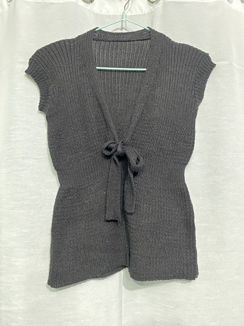 Black Knit Cap Sleeve Tie Front Cardigan (Category: Coats, Jackets and Outerwear) located in Cainta. Submitted by rmavg (Listing ID 1460089026, Image 3). Description: reminds me of that one jacquemes top! - Cap sleeves - Tie front detail at waist - Ribbed texture throughout - Estimated size: Small to Medium - Ideal for layering during cooler weather mop: gcash mod: gogo/jnt .