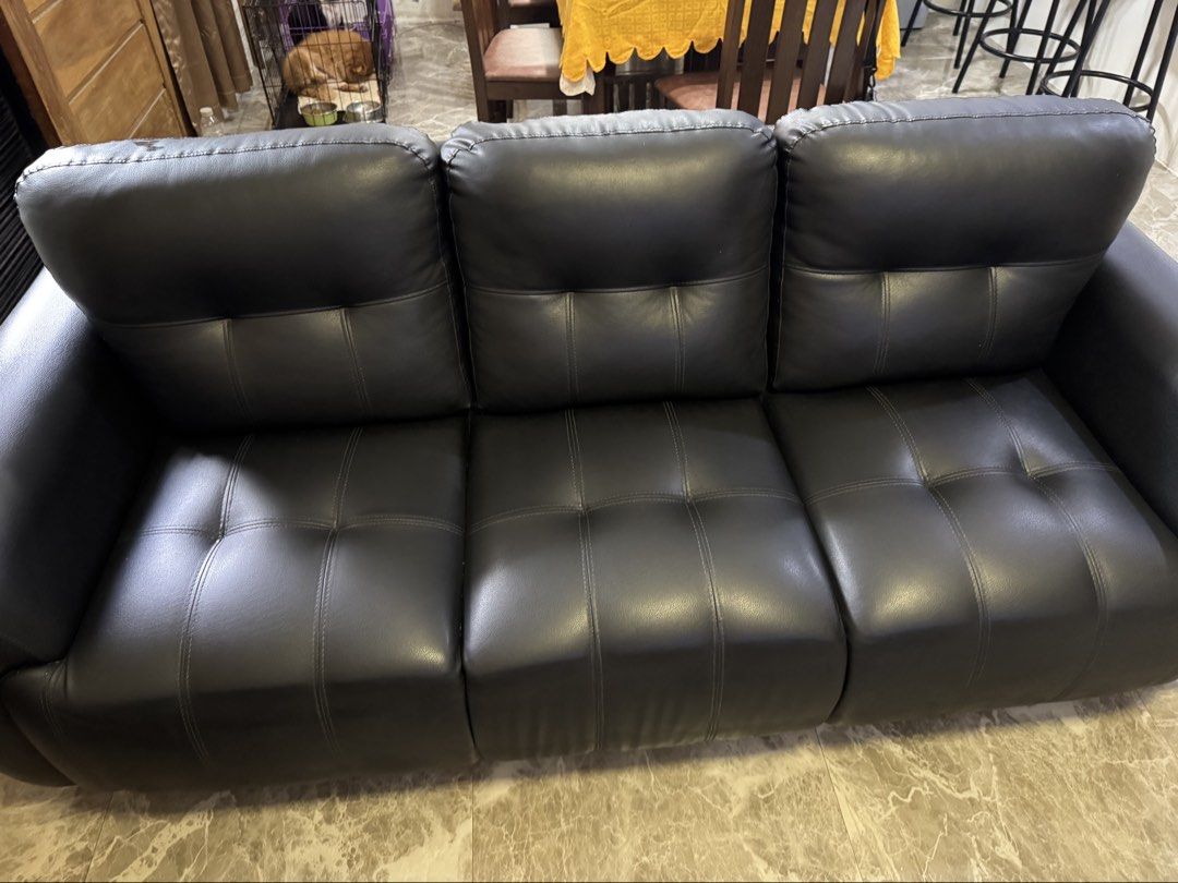 Black Leather Sectional Sofa with Ottoman (Category: Sofas) located in Valenzuela. Submitted by sosscheen (Listing ID 1459940025, Image 3). Description: - Stylish black faux leather sectional sofa - 3 comfortable seats - Includes a matching ottoman (can be used as footrest or extra seating) - Ideal for lounging and enhancing your living room - Great value for a versatile furniture piece -Bought from SM Home -Uratex foam **pick-up: Valenzuela City