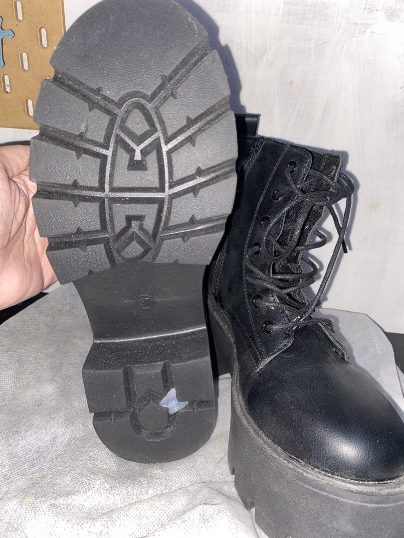Black Platform Lace-Up Combat Boots (Category: Boots) located in Mandaluyong City. Submitted by jmashlozada323 (Listing ID 1460013275, Image 3). Description: - Chunky black platform boots - Size 37 - Lace-up front with convenient side zipper - Thick lug sole for added height and superior grip - Super edgy and cool, ideal for alt or streetwear outfits - Versatile: pairs well with jeans, skirts, or dresses Condition: Used once No box * see actual p