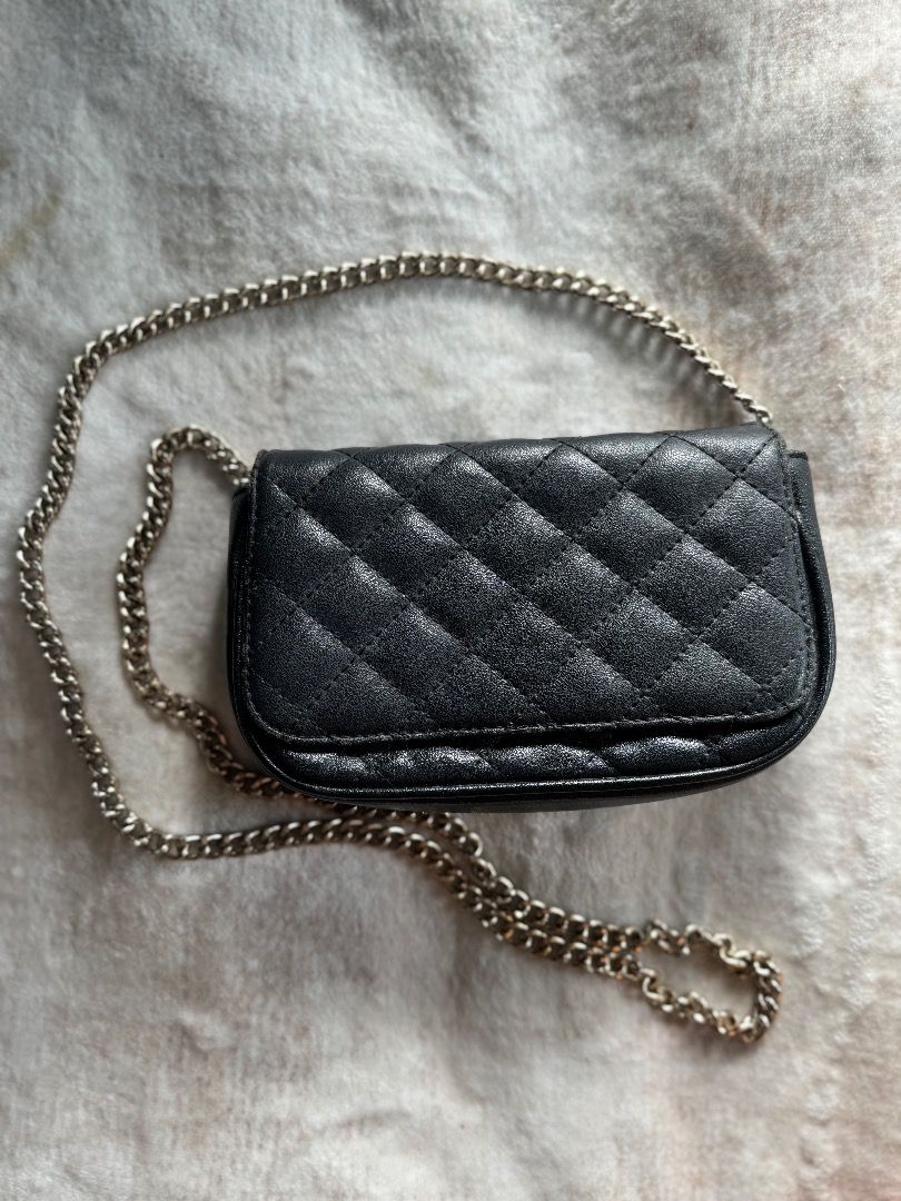 Black Quilted Chain Crossbody Bag (Category: Cross-body Bags) located in Caloocan City. Submitted by eogg30 (Listing ID 1460075321, Image 2). Description: - Cute black quilted bag - Silver chain strap - Small size, ideal for essentials - Magnetic snap closure - Subtle shimmer in material - Versatile for night outs or casual wear.