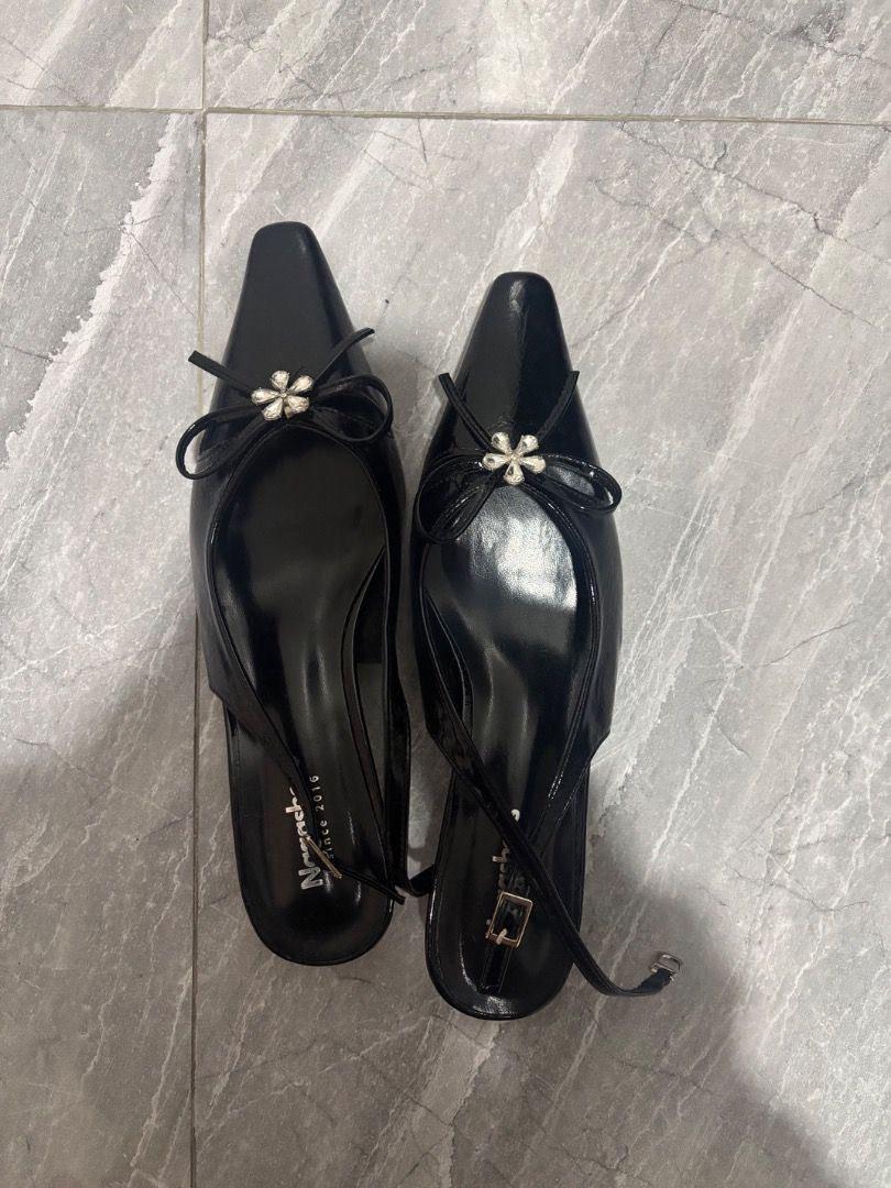 Black Slingback Heels with Bow and Gem Detail (Category: Heels) located in Caloocan City. Submitted by brightfox.935d92 (Listing ID 1460032968, Image 2). Description: 👠 Bought from Naga Shoes, Vietnam last month SIZE 38 🖤 Brand new & never been used/worn 📌 Reason for selling: Wrong size; Size: 38 💰 Only ₱600! 📍 Location: Angeles City / San Fernando, Pampanga 🛵 Lalamove: Available 🤝 Meet-up: Available 💳 Payment: GCash or Bank Transfer ❌ No