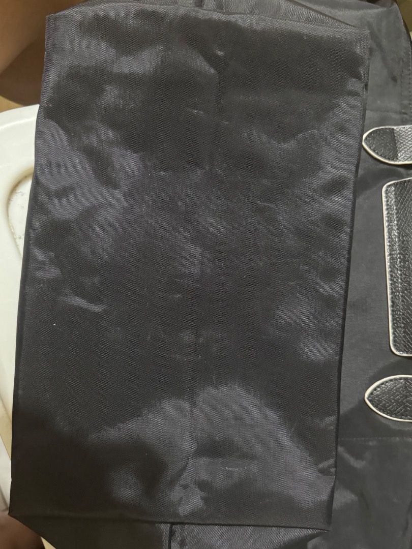Black Tote Bag with Leather Accents (Category: Tote Bags) located in Quezon City. Submitted by littlemissshopper07 (Listing ID 1460007640, Image 1). Description: - Stylish black tote bag - Genuine leather handles and trim - Interior zippered pocket for secure storage - Ideal size for everyday use and carrying essentials good as new.