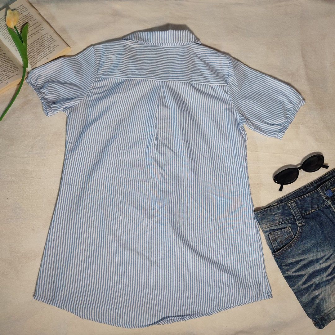 Blue and White Striped Shirt with Rose Patch (Category: Shirts) located in Antipolo. Submitted by _lovedbychie (Listing ID 1460036417, Image 2). Description: 🌸 Size: S-Semi M 🌸 Bust: 34" -35" • Length: 27" 🌸 MOP: Gcash / Maribank (payment first) 🌸 MOD: J&T / Lalamove Message me for more info!.