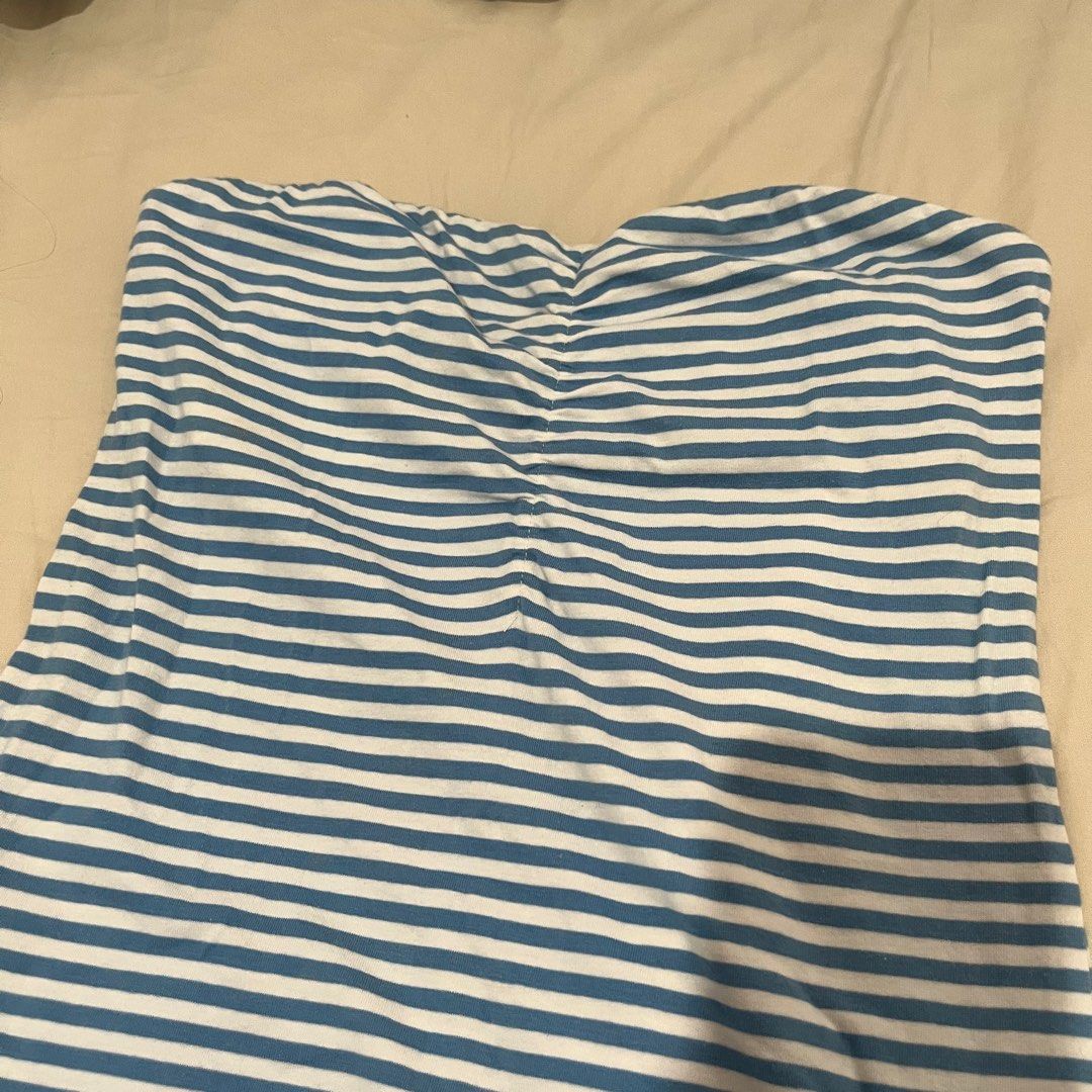 Blue and White Striped Tube Top (Category: Sleeveless) located in Manila. Submitted by julianasclozet (Listing ID 1459909758, Image 2). Description: - Adorable blue and white striped tube top - Stretchy material for a comfortable fit - Perfect for beach days or casual outings - Versatile: looks great with shorts or jeans - Easy to wear and super comfy.