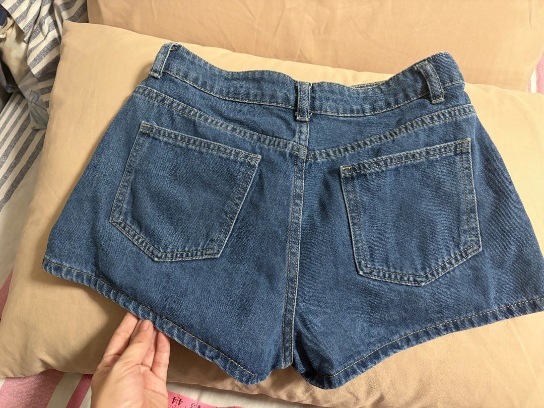 Blue Denim Shorts (Category: Shorts) located in Consolacion. Submitted by kkk_declutter (Listing ID 1460075569, Image 3). Description: - Classic blue denim shorts - High-waisted style - Zip fly and button closure - Two front pockets - Two back pockets - Frayed hem detail - Ideal for casual wear Location Casili Consolacion Payment First BDO or Gcash Buyer shoulders the delivery Fee.