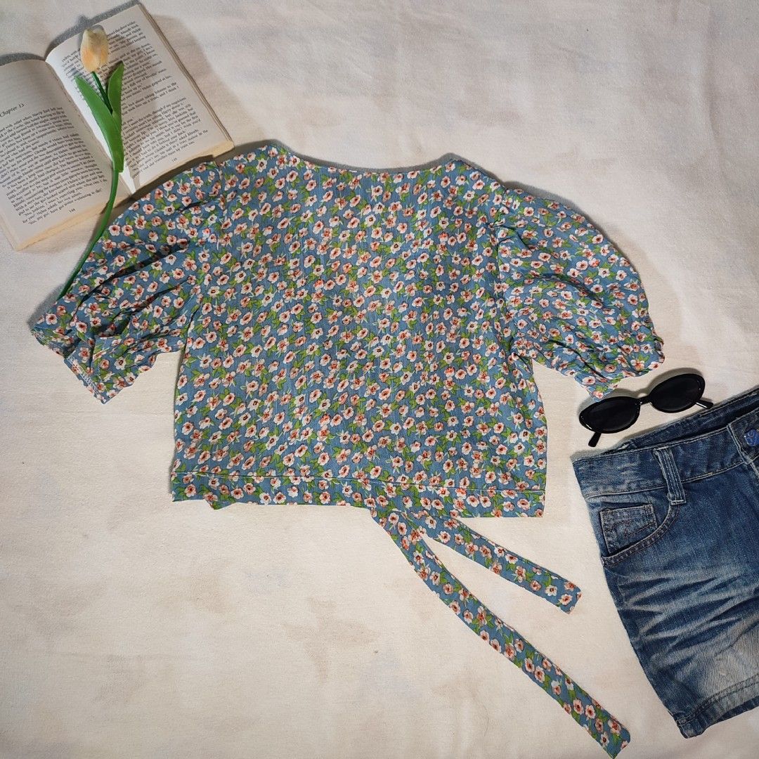 Blue Floral Puff Sleeve Wrap Crop Top (Category: Blouses) located in Antipolo. Submitted by _lovedbychie (Listing ID 1460055430, Image 2). Description: 🌸 Size: S-Semi M 🌸 Bust: 32"- 34" • Length: 16" 🌸 MOP: Gcash / Maribank (payment first) 🌸 MOD: J&T / Lalamove Message me for more info! 🌷.