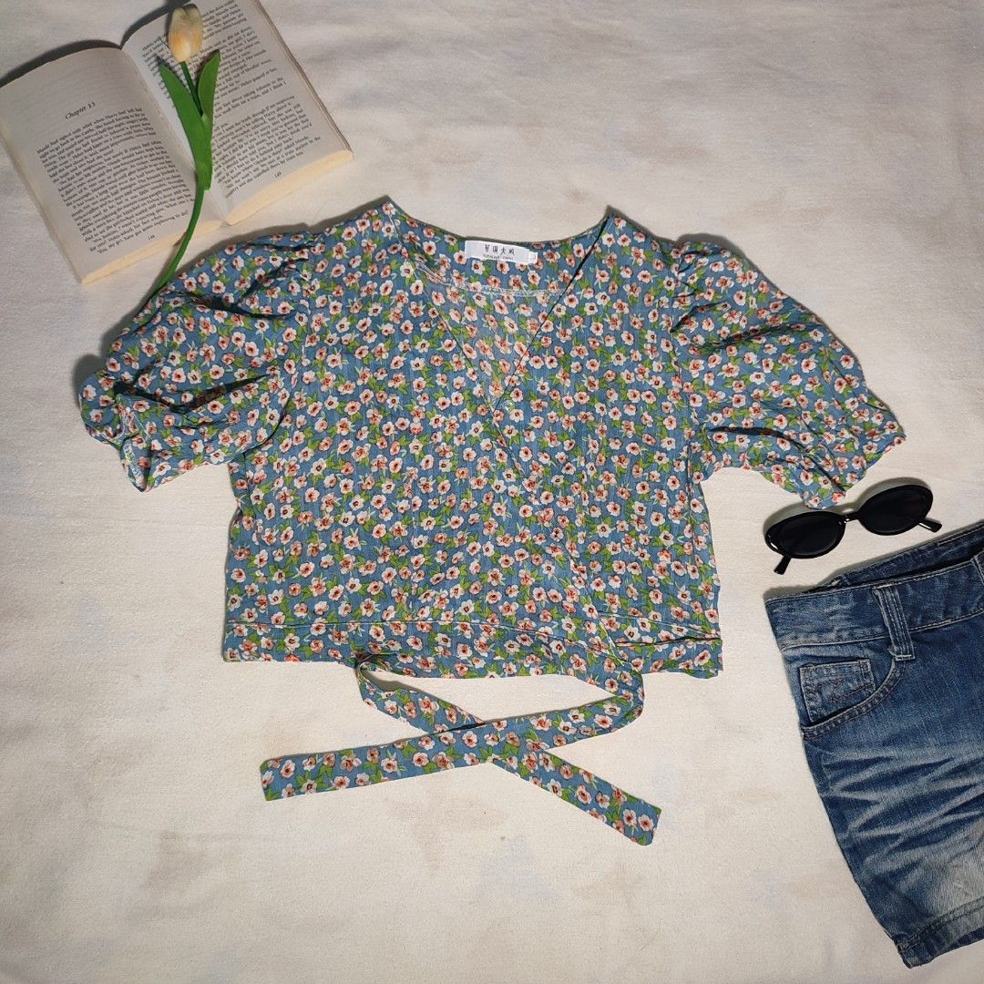 Blue Floral Puff Sleeve Wrap Crop Top (Category: Blouses) located in Antipolo. Submitted by _lovedbychie (Listing ID 1460055430, Image 1). Description: 🌸 Size: S-Semi M 🌸 Bust: 32"- 34" • Length: 16" 🌸 MOP: Gcash / Maribank (payment first) 🌸 MOD: J&T / Lalamove Message me for more info! 🌷.