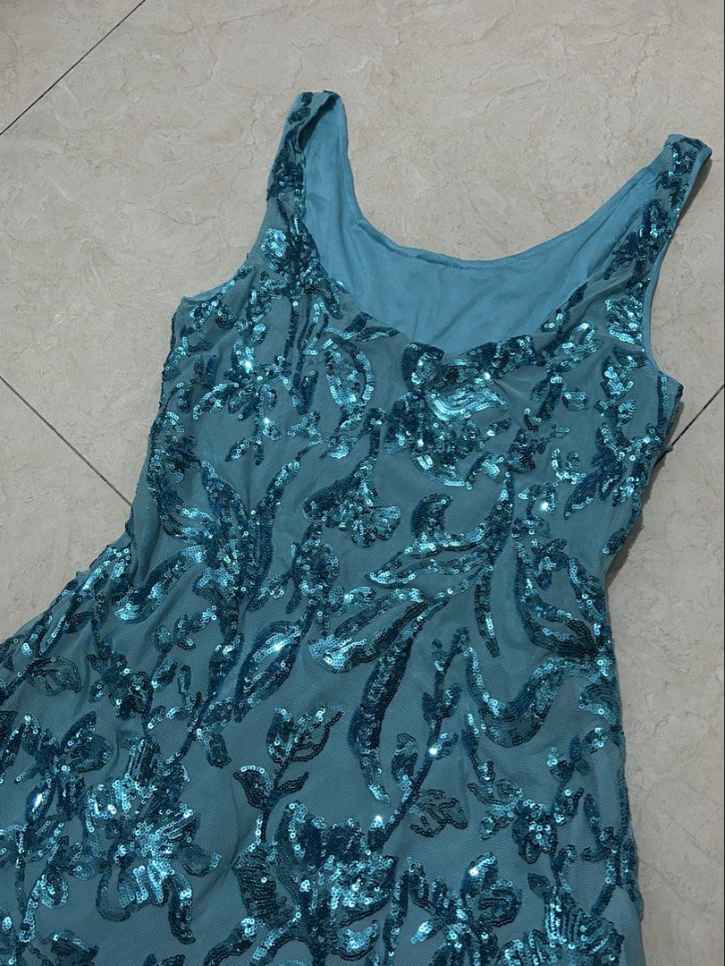 Blue Sequined Dress (Category: Dresses) located in Calamba. Submitted by thingsilovedd (Listing ID 1460053830, Image 2). Description: Small Size on Tag but kasya po hanggang Medium. I haven’t used this yet pero nalabhan na sya kaya like new parin condition. .