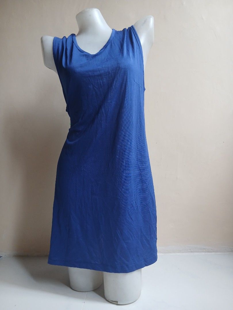 Blue Sleeveless Dress (Category: Dresses) located in Tayabas. Submitted by ahrcelllego (Listing ID 1460056409, Image 1). Description: - Simple blue sleeveless dress - Features a subtle textured fabric pattern - Comfortable and casual design - Ideal for everyday wear - Great for layering - Easy to style.