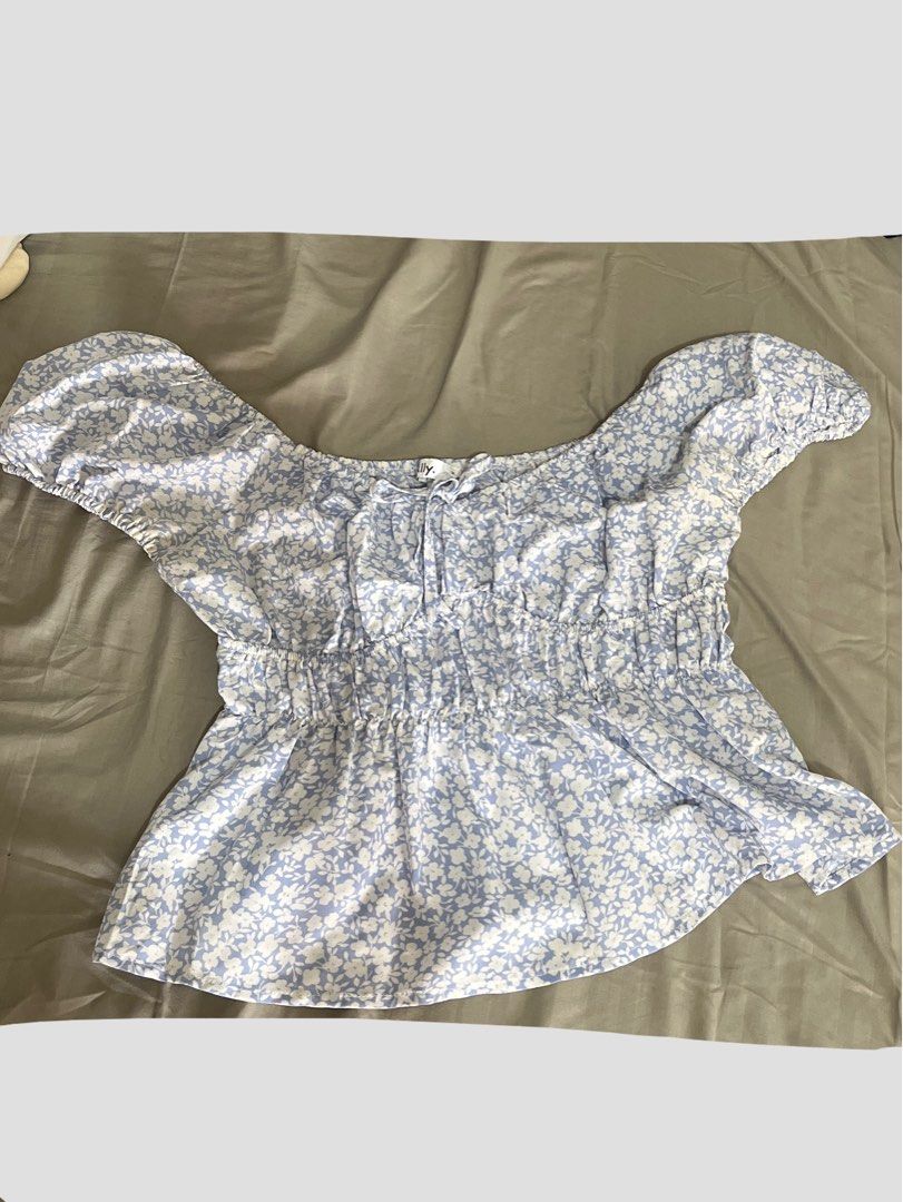 Blue Smocked Peplum Top (Category: Blouses) located in Quezon City. Submitted by owlettereads (Listing ID 1459988601, Image 1). Description: never worn, cute top! fits size m to large Location: Quezon City MOP: GCash/Maribank/BPI/UB MOD: lalamove or J&T .