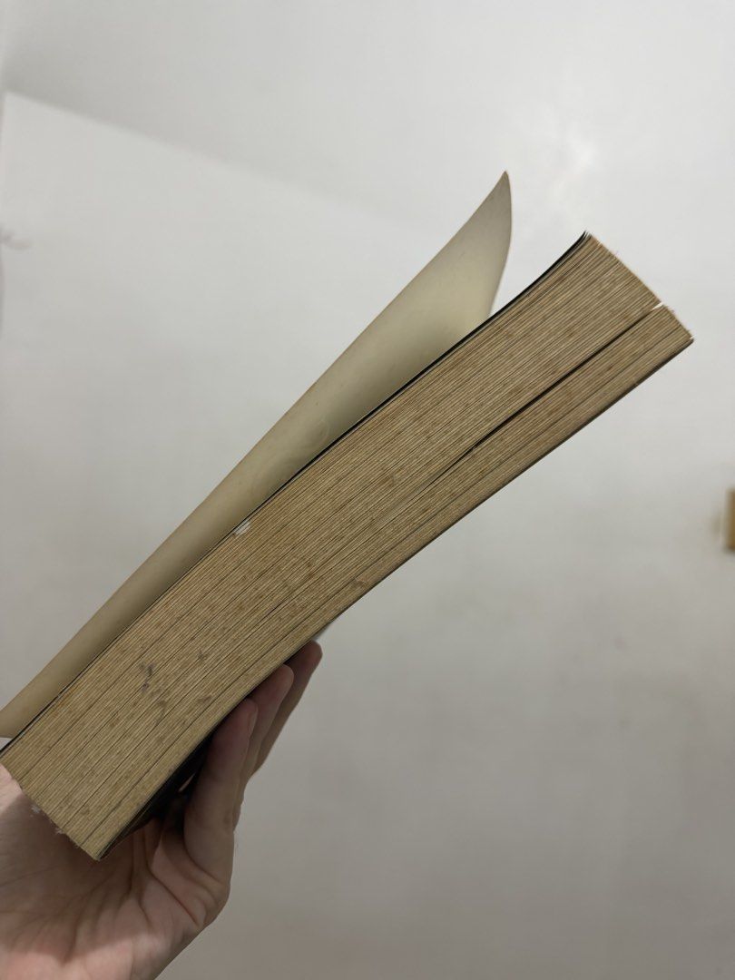 Book with yellowed pages, side view (Category: Storybooks) located in Bulacan. Submitted by mariaanaligaya (Listing ID 1460029043, Image 2). Description: - Paperback book - Pages are aged and yellowed - Edges have discoloration and minor marks from use - Binding is intact - Sold as is.