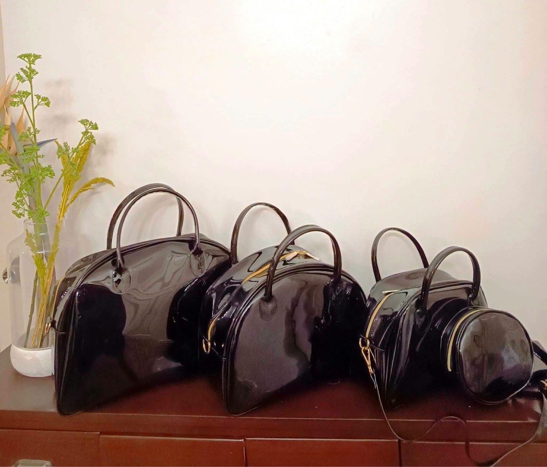 BOWLER Transparent & Patent Handbag Set with Pouch (Category: Tote Bags) located in Marikina City. Submitted by dapple (Listing ID 1460076304, Image 3). Description: BOWLER BAG SIZE. : LARGE, MEDIUM and SMALL LARGE : 16inL x 15inH x 5 MEDIUM : 13inL x 7.5inH x 6 SMALL. : 12inL x 8.5inH x 4 COLORS. : BLACK , BROWN and WHITE.