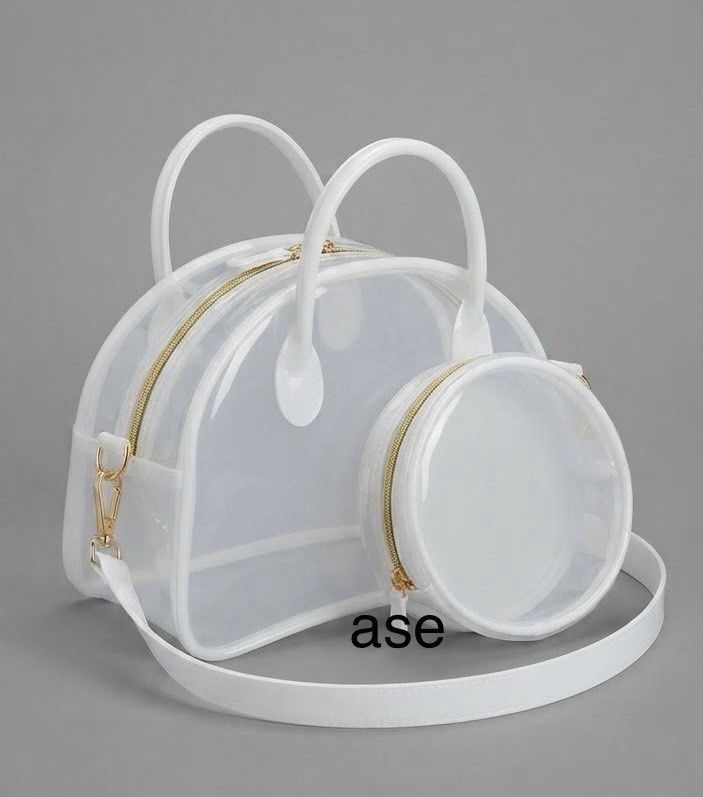 BOWLER Transparent & Patent Handbag Set with Pouch (Category: Tote Bags) located in Marikina City. Submitted by dapple (Listing ID 1460076304, Image 1). Description: BOWLER BAG SIZE. : LARGE, MEDIUM and SMALL LARGE : 16inL x 15inH x 5 MEDIUM : 13inL x 7.5inH x 6 SMALL. : 12inL x 8.5inH x 4 COLORS. : BLACK , BROWN and WHITE.