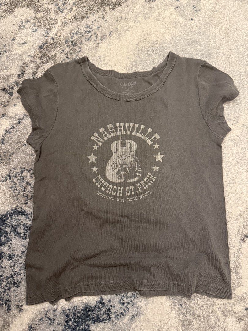 Brandy Melville Nashville Grey Tee (Category: Shirts) located in Manila. Submitted by ell4scloset (Listing ID 1460085504, Image 1). Description: - bought from brandy Hawaii - super soft ! Love the graphic, dont mind keeping if unsold - will come w brandy stickers Rfs: decluttering .