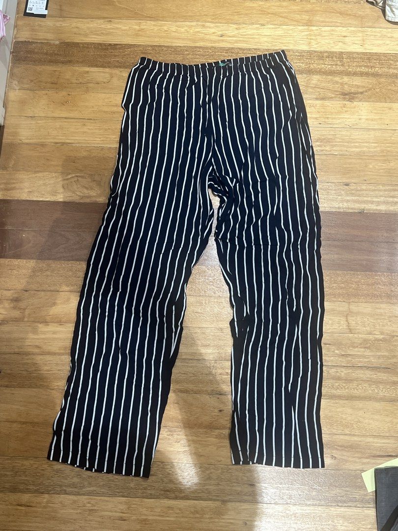 Brandy Melville Striped Pants (Category: Other Bottoms) located in Quezon City. Submitted by iminquezoncity (Listing ID 1460027328, Image 1). Description: - Classic navy and white stripes - Comfortable elastic waistband - Trendy wide-leg fit - Versatile for casual wear - Easy to pair with any top.