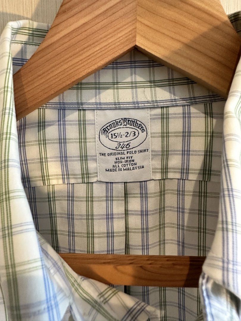 Brooks Brothers 346 Original Polo Shirt Plaid Button Down (Category: Tshirts & Polo Shirts ) located in Pasig City. Submitted by donsalta (Listing ID 1460018924, Image 2). Description: - Brooks Brothers 346 Original Polo Shirt - Slim Fit, Non-Iron - 100% Cotton - Classic Blue & Green Plaid Pattern - Button-Down Collar - Measurements: Length approx. 31 inches, Chest approx. 22 inches - Perfect for Casual or Smart-Casual Outfits.
