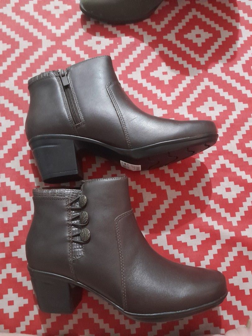 Brown Ankle Boots with Zipper and Button Detail (Category: Boots) located in Manila. Submitted by joyhufalar (Listing ID 1459924836, Image 1). Description: - Chic brown ankle boots - Easy side zipper closure - Stylish decorative buttons and textured trim detail - Comfortable block heel - Versatile for casual outings or dressing up.