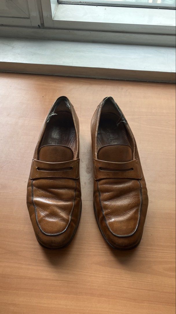 Brown penny loafers - Cole Haan (Category: Dress Shoes) located in Manila. Submitted by foundgoods00 (Listing ID 1459969549, Image 2). Description: Brown leather penny loafers. Still good for a classic look. Sign of usage.