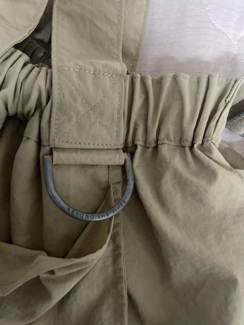 BTV Dumpling Bag XS (Khaki) (Category: Cross-body Bags) located in Bacoor. Submitted by rmsc0716 (Listing ID 1460012915, Image 2). Description: Authentic Beyond the Vines Dumpling Bag XS (Khaki) Comes with Shopper’s Tote Issues: Peeled-off on the Metal Hardware, Slight Stains RFS: Decluttering from collection.