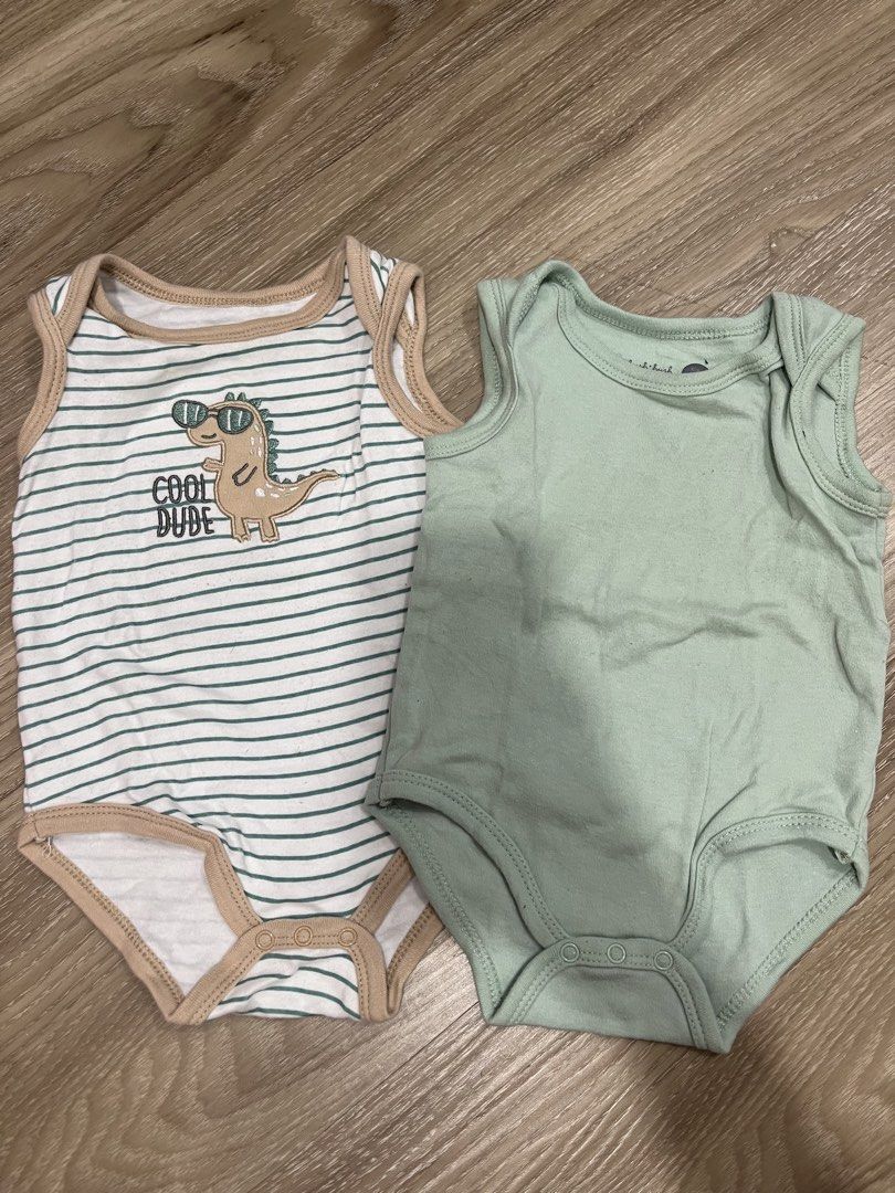 Bundle Baby Bodysuits - Carter's, Disney, SM Dept Store (Category: Babies & Kids Fashion) located in Manila. Submitted by shannendorithie (Listing ID 1460017802, Image 2). Description: - Bundle baby bodysuits - Includes Carter's brand (bear, stripes) - Includes Disney brand (Winnie the Pooh) - Features other cute prints: robots, rockets, cool dude dinosaur - Mix of short sleeve and sleeveless styles - Great for everyday wear.