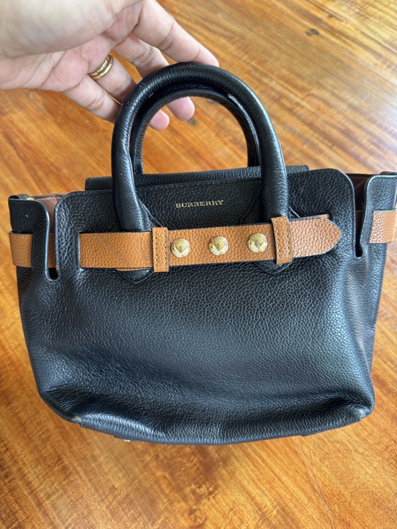 Burberry Leather Belt Sling (Category: Cross-body Bags) located in Cauayan City . Submitted by espiritucj (Listing ID 1459921147, Image 2). Description: 9”W x 7.5”H x 3”D 3” handle drop 19-21” Thrifted Minor rubs Replaced Sling.