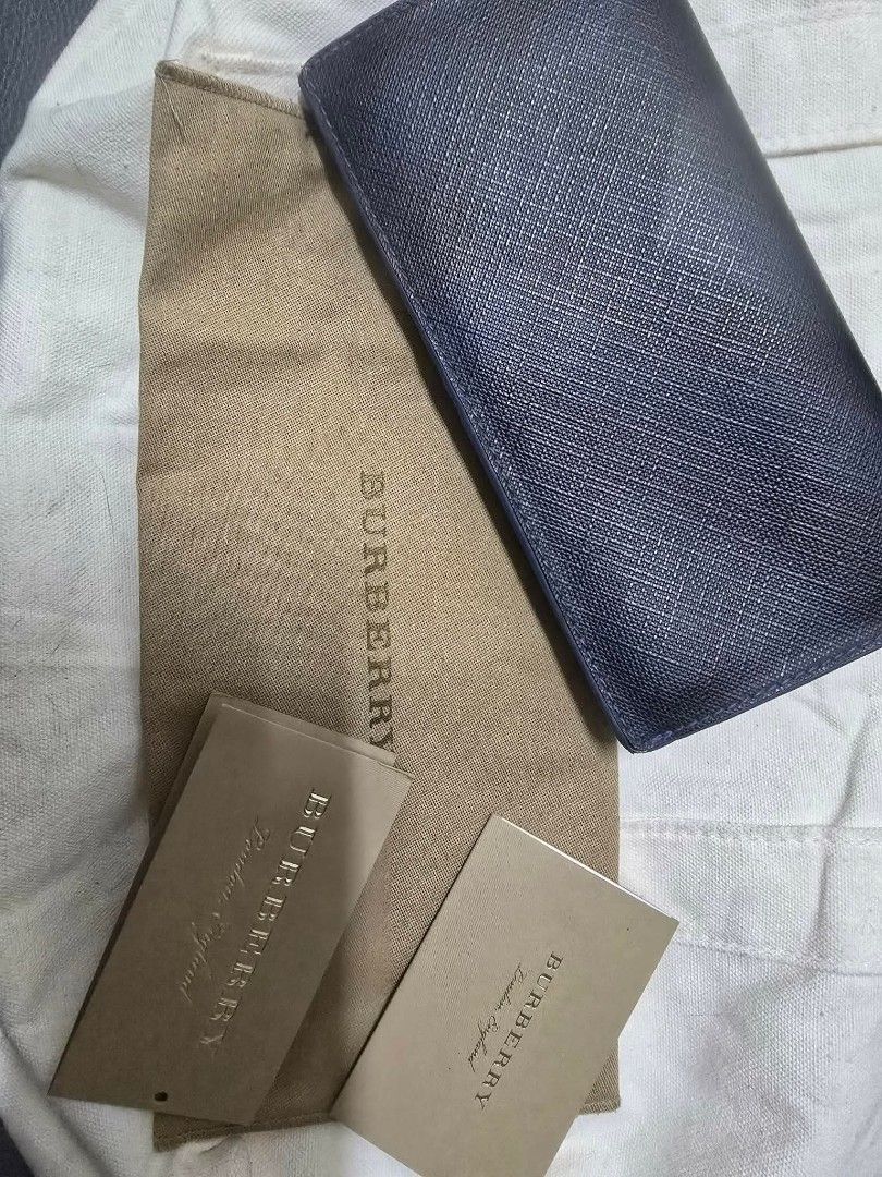 Authentic Burberry Long Wallet Blue Check Leather (Category: Luxury Bags & Wallets) located in Manila. Submitted by basicness (Listing ID 1459900437, Image 2). Description: - Authentic Burberry long wallet - Classic blue check exterior - Vibrant blue leather interior - Multiple card slots - Zippered compartment - Includes dust bag and authenticity cards - Perfect for organizing essentials NEGOTIABLE.