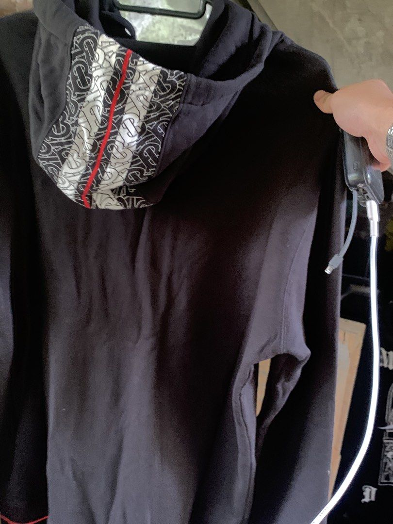 Burberry Monogram Stripe Panel Cotton Hoodie (Category: Luxury Apparel) located in Caloocan City. Submitted by niannnnnnnnnn (Listing ID 1460041764, Image 3). Description: - Authentic Black Burberry Hoodie - Features iconic Monogram Stripe Panel - Red and White Stripe Details - Burberry London England Patch on Chest - Ideal for Casual Wear brandnew af .