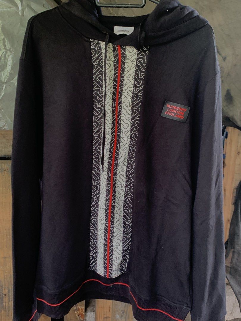 Burberry Monogram Stripe Panel Cotton Hoodie (Category: Luxury Apparel) located in Caloocan City. Submitted by niannnnnnnnnn (Listing ID 1460041764, Image 2). Description: - Authentic Black Burberry Hoodie - Features iconic Monogram Stripe Panel - Red and White Stripe Details - Burberry London England Patch on Chest - Ideal for Casual Wear brandnew af .
