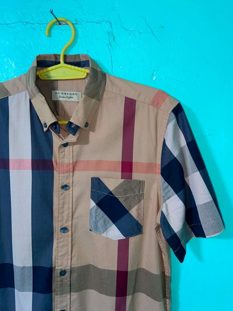 Burberry Short Sleeve Button Up Shirt Nova Check (Category: Tshirts & Polo Shirts ) located in Caloocan City. Submitted by newmetho (Listing ID 1459990234, Image 2). Description: 20x27 ask for more details .