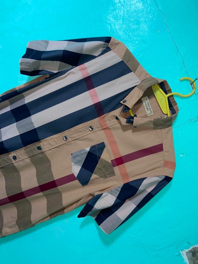 Burberry Short Sleeve Button Up Shirt Nova Check (Category: Tshirts & Polo Shirts ) located in Caloocan City. Submitted by newmetho (Listing ID 1459990234, Image 3). Description: 20x27 ask for more details .