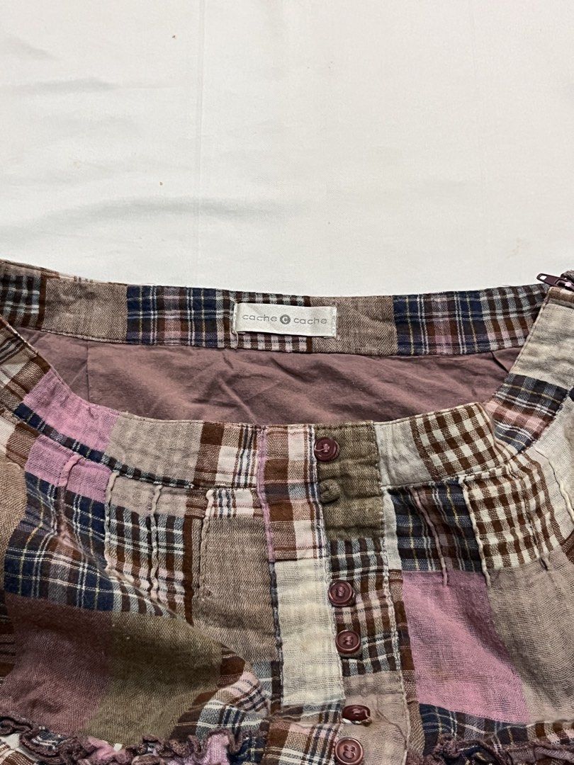 Cache cache rare patchwork button down layered skirt (buttons not working, design only) (Category: Skirts) located in Santa Rosa. Submitted by spanishlattelxver (Listing ID 1460099020, Image 3). Description: ⋆ 𝒷𝓇𝒶𝓃𝒹 : Cache Cache ⋆ 𝓂𝑒𝒶𝓈𝓊𝓇𝑒𝓂𝑒𝓃𝓉𝓈 : ↳ 𝓌𝒶𝒾𝓈𝓉 : 28-29 ↳ 𝓁𝑒𝓃𝑔𝓉𝒽 : 14 ⋆ 𝒻𝓁𝒶𝓌𝓈 : missing 1 button and washable stain 𓏲ּ𝄢 𝒹𝑒𝓉𝒶𝒾𝓁𝓈 : cute patchwork design and super ganda ng telaaa! ⋆˚꩜｡ 𝒎𝒊𝒏𝒆 : ₱299.