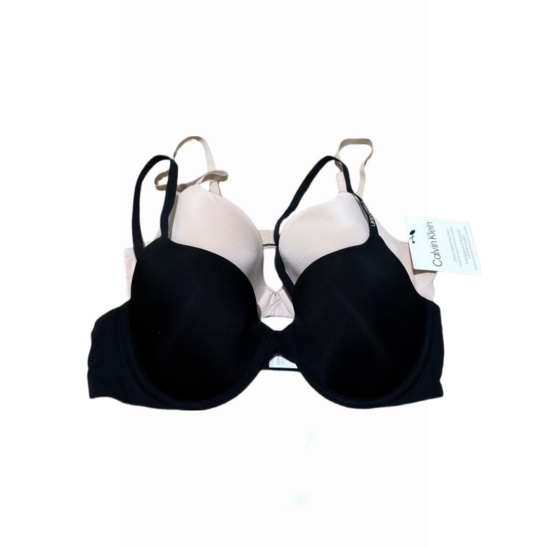 Calvin Klein 2-Pack Lightly Lined Demi Bras (36B) (Category: Undergarments & Loungewear) located in Dasmarinas. Submitted by beisells (Listing ID 1460079528, Image 1). Description: Calvin Klein Bras - Bought from Canada - Set of 2 Calvin Klein bras - Lightly lined demi style - Colors: Black and Nude Beige - Ideal for everyday comfort and support - Brand new with original tags attached.