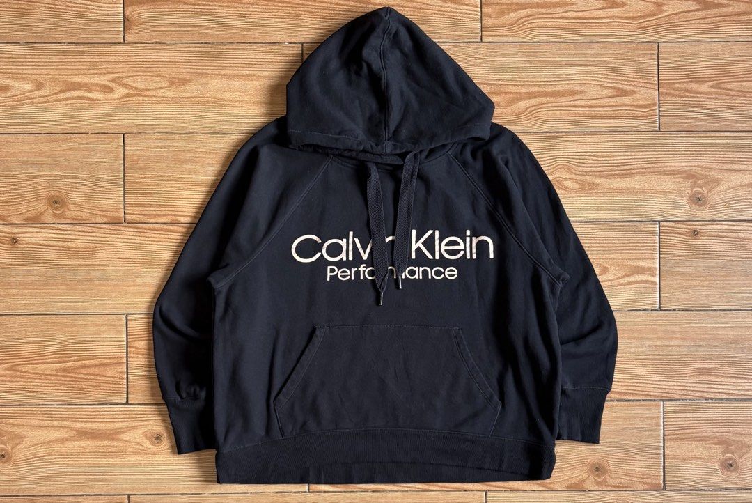 CALVIN KLEIN PERFORMANCE HOODIE JACKET (Category: Coats, Jackets and Outerwear) located in Makati City. Submitted by jnc__apparel (Listing ID 1460071659, Image 1). Description: 🏷️ CALVIN KLEIN PERFORMANCE HOODIE JACKET 📌 Dimes: 24L x 24.5W 📌 Size: Large for womens 📌 Condition: Like new 📌 Color rate: 10/10 📌 Issue: None ✅ Washed and ready to wear.
