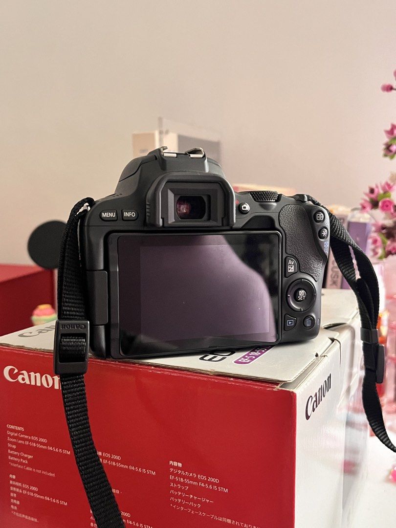 Canon EOS 200D Kit Lens with Box (Category: Cameras) located in Quezon City. Submitted by hellopucca (Listing ID 1459943975, Image 3). Description: - Canon EOS 200D DSLR camera - Comes with kit lens - Original box included - Lightweight and compact design - Ideal for beginners - No flaws except for the part near battery but no impact on performance. Battery still locks and its closing door..