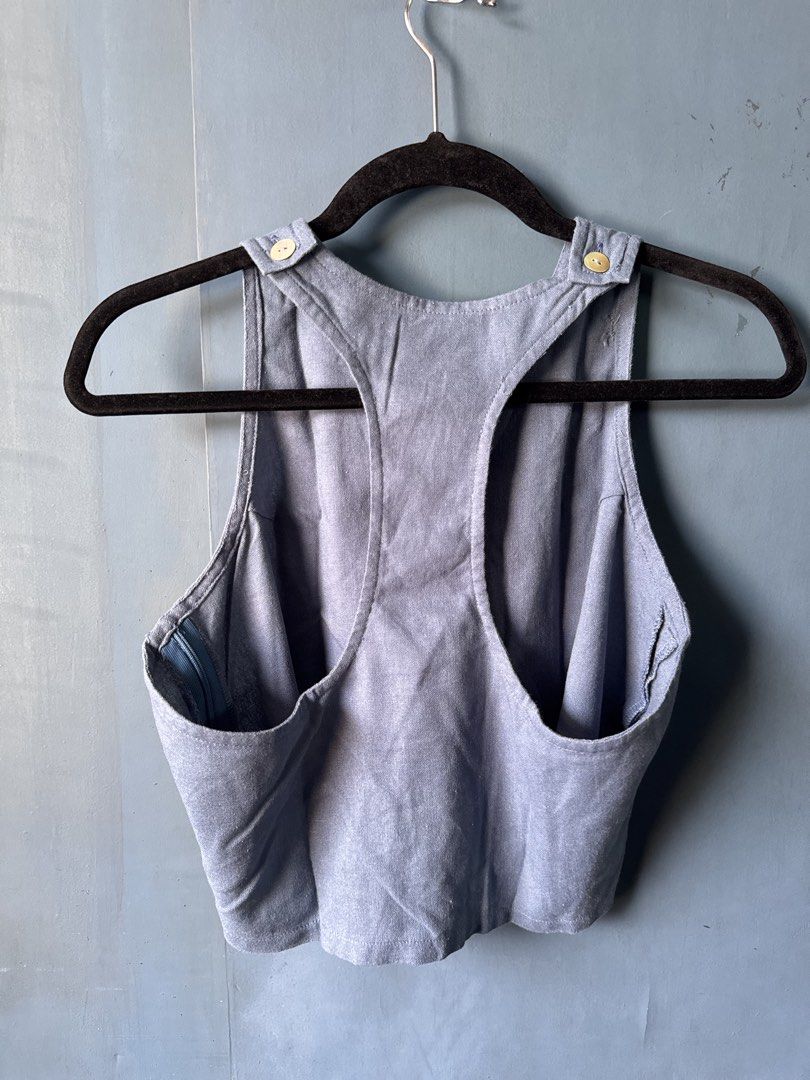 Cariño Romina Top in Denim (Category: Sleeveless) located in Manila. Submitted by reesespiecess (Listing ID 1460062169, Image 2). Description: - Blue racerback crop top - Zipper closure at the back - Size: L - Please see linen condition — it arrived as is so no to sensi buyers :) - Great for casual wear or layering.