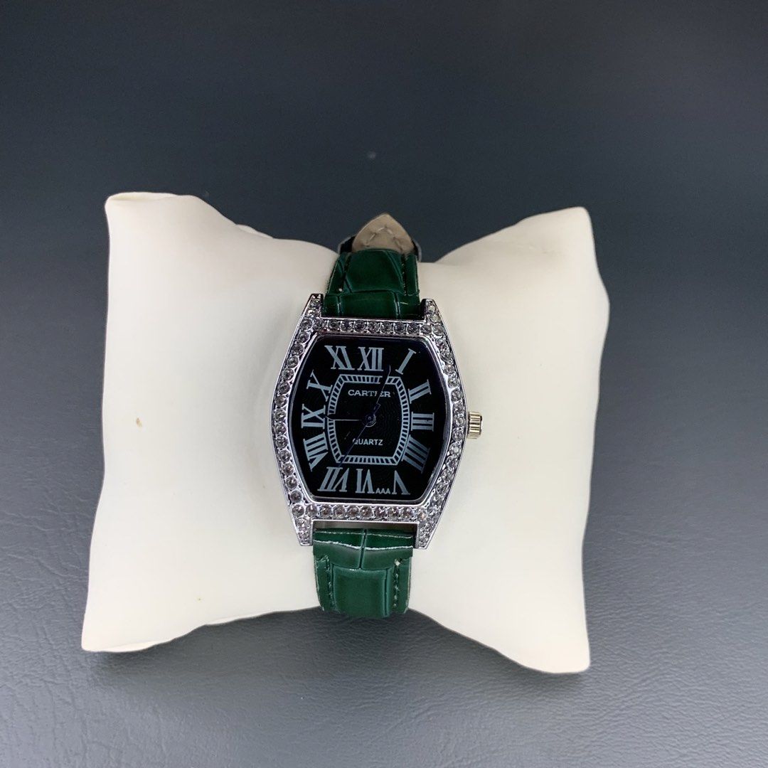 Cartier Quartz Watch - Green Leather Strap (Category: Women's Watches) located in Manila. Submitted by renci644 (Listing ID 1460054133, Image 3). Description: Elegant green Cartier quartz watch with octagon case and crystal accents. Features Roman numerals and a glossy green leather strap..
