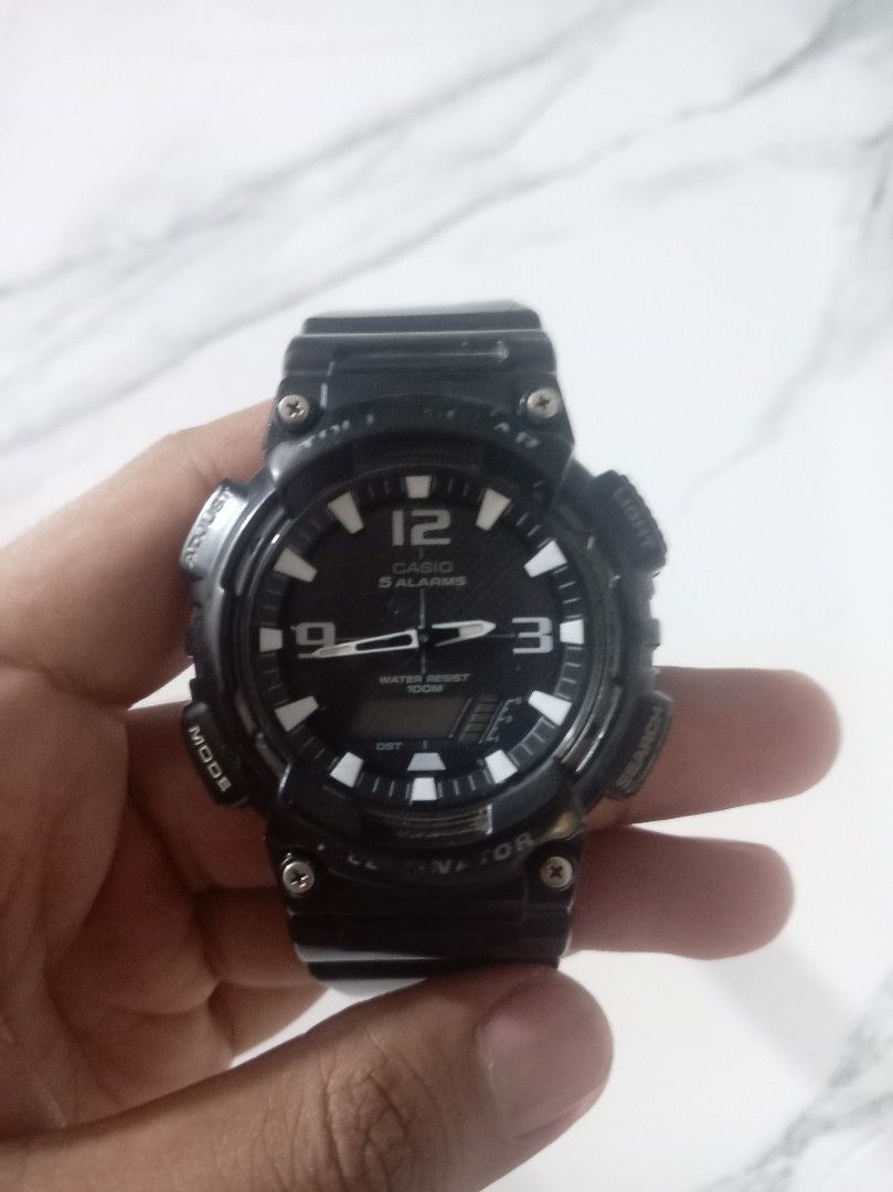 Casio AQ-S810W-1AV (Category: Luxury Watches) located in Quezon City. Submitted by vynnn26 (Listing ID 1459959829, Image 1). Description: - Brand: Casio AQ - Color: Black - Display: Digital with Analog Hands - Features: 5 Alarms, Water Resistant - Controls: Side buttons for Mode, Adjust, Light - Strap: Black - Ideal for: Everyday wear, Sports -ORIGINAL PRICE: ₱5440 ISSUES: - Needs new battery.