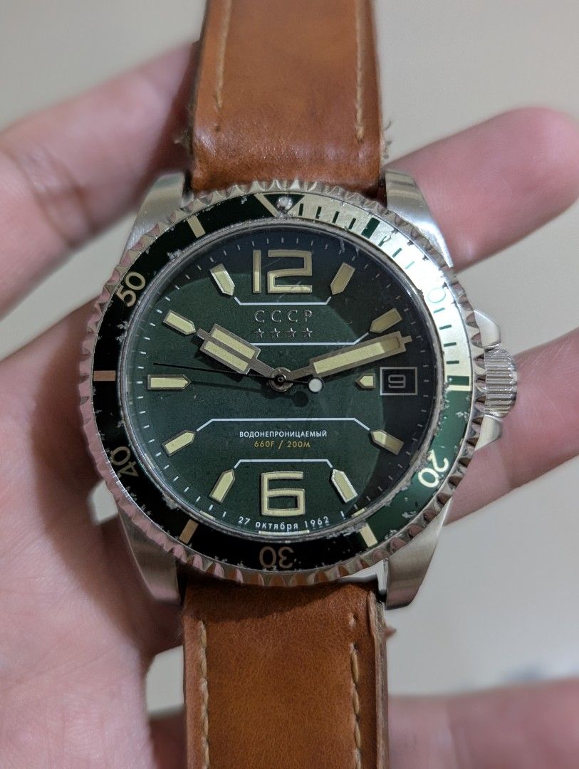 CCCP Automatic Dive 200m Russian Watch (Category: Luxury Watches) located in Quezon City. Submitted by dustydialsph (Listing ID 1460079271, Image 1). Description: - Vintage CCCP automatic dive watch - Made in USSR - Green dial with luminous hands and markers - Date window at 3 o'clock - Water resistant 200m/660ft - Rotating bezel - Comes with a brown leather strap - Unique dial date: 27 October 1962.