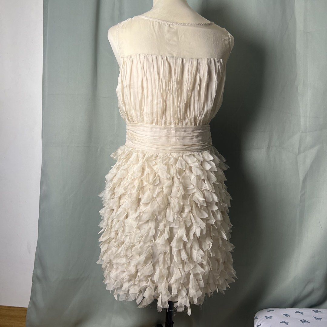cciguni silk party dress (Category: Dresses) located in Malabon City. Submitted by minidressmonster (Listing ID 1459986796, Image 2). Description: cciguni beige 100% silk ruffled party formal birthday dress very gossip girl haha side zip and has inner lining needs wash, a little dusty due to storage best fit small to medium dimensions bust: 32 in waist: 28 in length: 29 in.