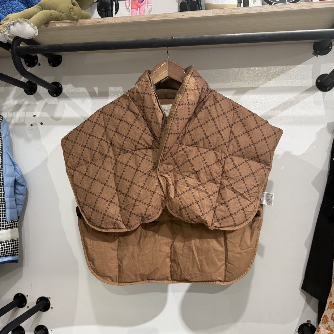 Celine Paris Puffer Monogram Vest (Category: Coats, Jackets and Outerwear) located in Bambang. Submitted by heats777 (Listing ID 1460081444, Image 2). Description: Excellent condition No issues Deaturing a puffer monogram designs .