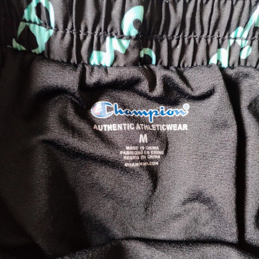 Champion Athleticwear Shorts Size M (Category: Shorts) located in Davao. Submitted by belles_pre_loved (Listing ID 1459911236, Image 2). Description: - Black Champion shorts with all-over logo print - Features a pastel colorway with pink and teal accents - Elastic waistband for a comfortable fit - Great for workouts or casual wear.