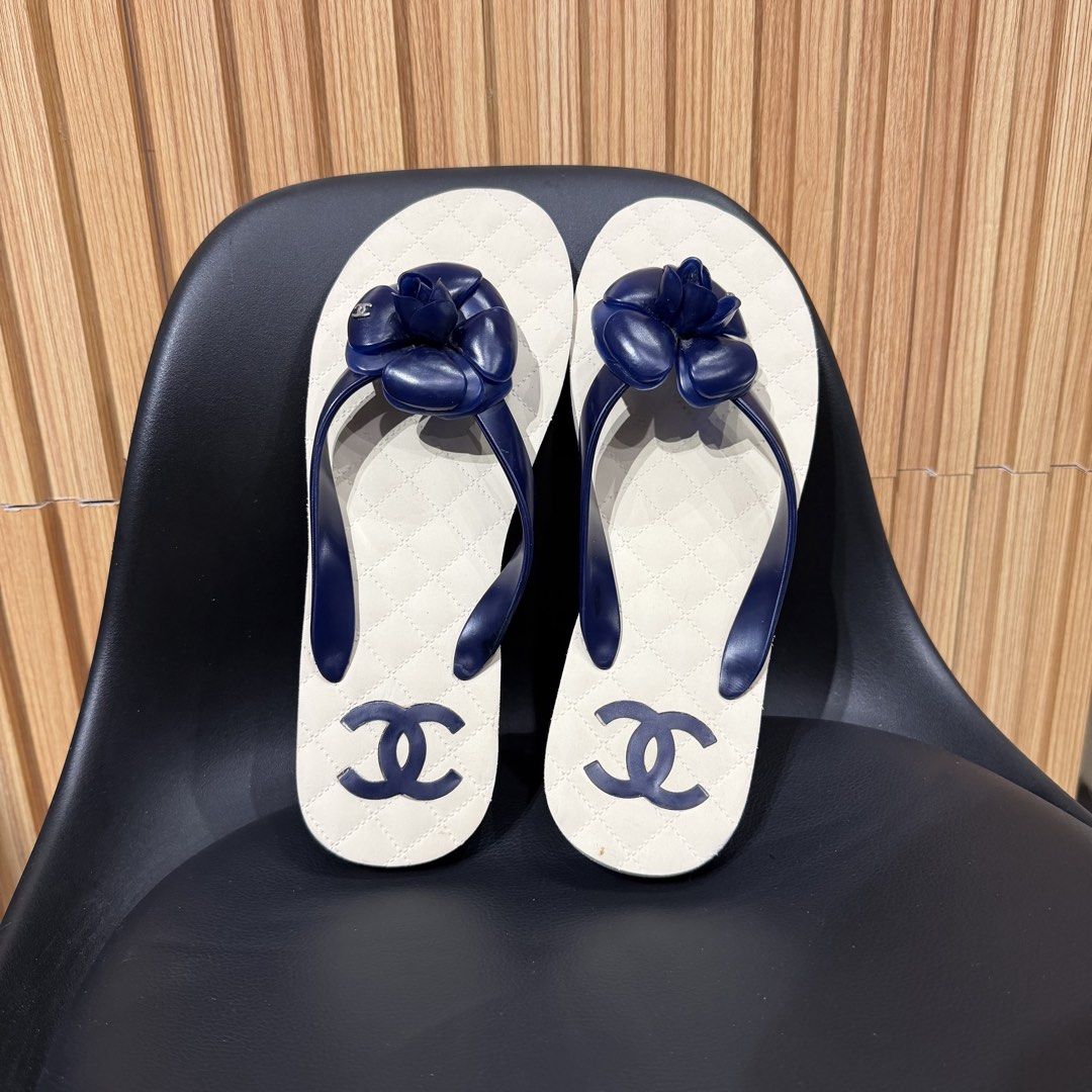 Chanel Camellia rubber flip-flops (Category: Sandals) located in Bambang. Submitted by heats777 (Listing ID 1460073668, Image 3). Description: Excellent condition No issues at all Featuring quilted footbed rubber flipflops.