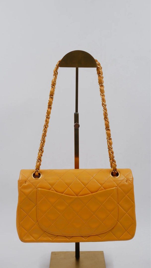 Chanel vintage classic flap series 3 (Category: Luxury Bags & Wallets) located in Quezon City. Submitted by slluxury_ph (Listing ID 1460087504, Image 2). Description: Overall Condition: Excellent Exterior Condition: Excellent Interior Condition: Excellent Rank: A Material: Lambskin Leather Made in: France Color: Mustard Measurements: L23CM X W6.5CM X H14CM Hardware: GHW Inclusions: Provided Dust Bag.