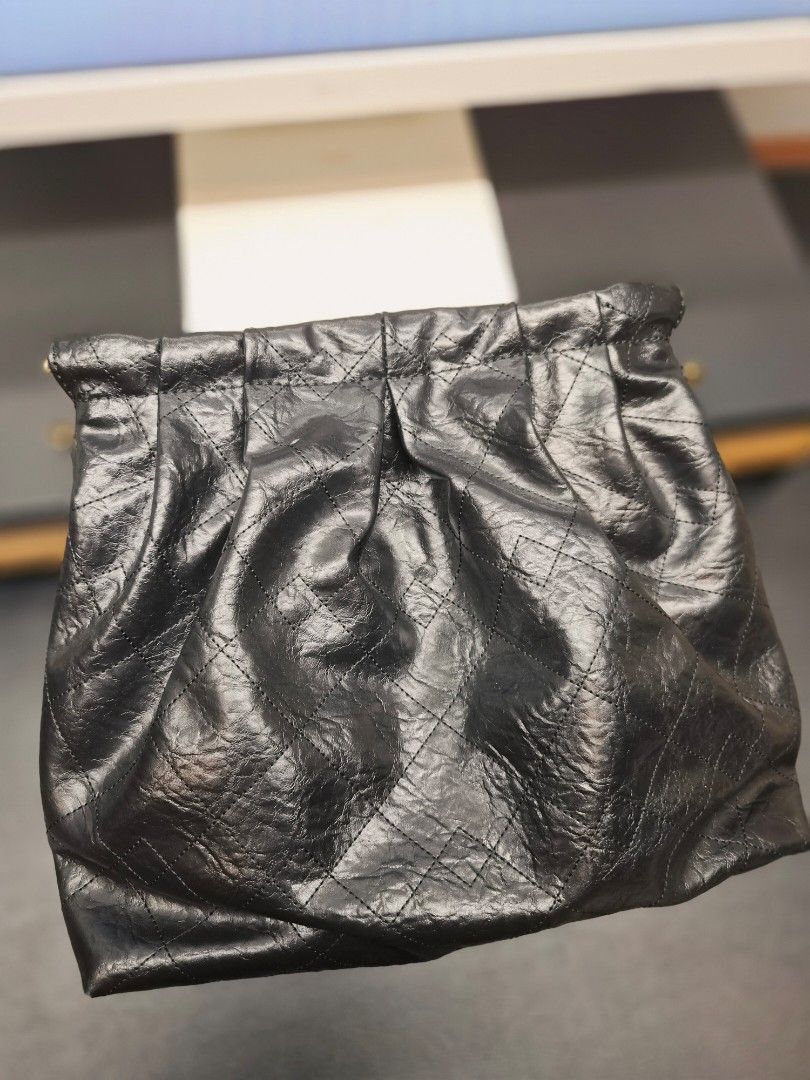 Charles & Keith Black Quilted Chain Shoulder Bag (Category: Shoulder Bags) located in Taytay. Submitted by allthingslove_riz (Listing ID 1460019700, Image 3). Description: - Brand: Charles & Keith - Style: Quilted Shoulder Bag - Color: Black - Material: Crinkled texture - Hardware: Gold chain strap - Closure: Zipper - Versatile: Great for casual or dressy looks Such a steal! In really great shape. Used 2x only! Comes with its original dust bag..